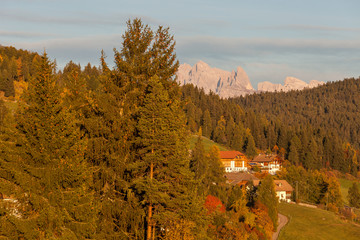 Small houses and farms with dolomites background, Renon/Ritten, Alto Adige/South Tyrol, Italy