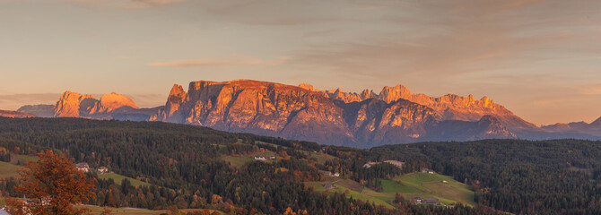 Sunset on Renon/Ritten plateau with awesome dolomites background, Alto Adige/South Tyrol, Italy