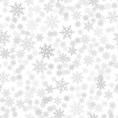 Seamless pattern. Christmas abstract background made of snowflakes on white. Design postcards, posters, greeting for the new year.