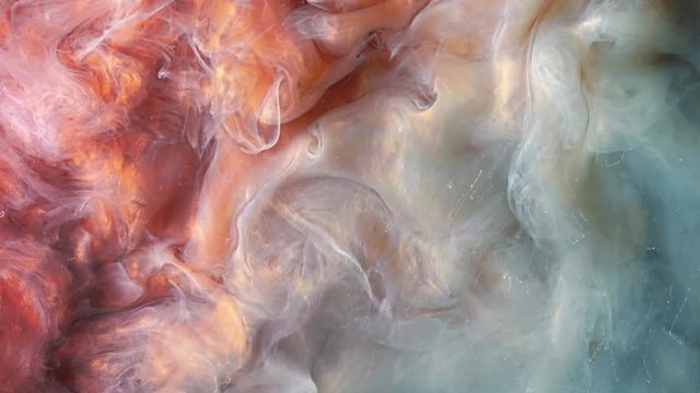 Colorful red/white paint drops mixing in water. Ink swirling underwater. Colored acrylic cloud abstract smoke explosion animation. Close up view