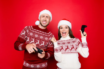December noel, funky, happiness, friendship. Excited married couple in knitted traditional x mas...