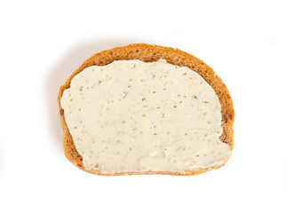Bread slice with cream cheese isolated on a white background