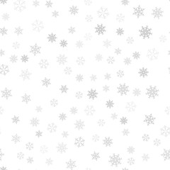 Seamless pattern. Christmas abstract background made of snowflakes on white. Design postcards, posters, greeting for the new year.