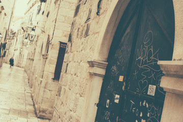 Fototapeta na wymiar Grafitti on a door in Dubrovnik old town europe