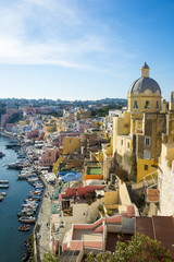 Beautiful late afternoon view of Corricella harbour on the island of Procida, Italy.