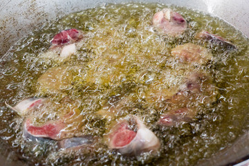 Fry food in hot oil