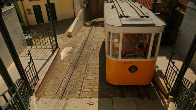 Close-up shot of the Elevador do Lavra funicular tram elevator, also known as Ascensor do Lavra, in Lisbon, Portugal. Inaugurated in 1884, it is the oldest funicular in Lisbon.