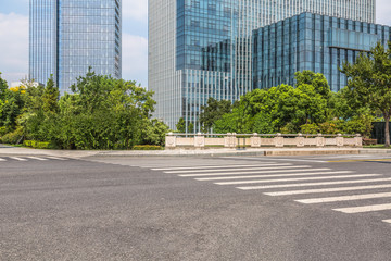 Empty urban road and modern buildings