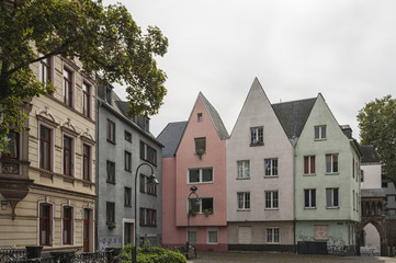 Fototapeta na wymiar COLOGNE, GERMANY - SEPTEMBER 11, 2016: Colorful houses in Bavarian style in the old town of Cologne, North Rhine-Westphalia
