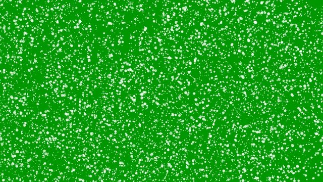 Abstract background with snow. Snowfall on green screen. Alpha channel chroma key transparent background. Seamless loop. Snow falling. White snow.