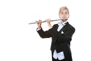 Male flutist wearing tailcoat plays flute © anetlanda
