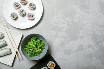 Japanese sushi and green beans on a white background