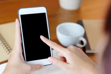 Woman hands using smart phone with blank screen background for mock up, template, technology and lifestyle concept