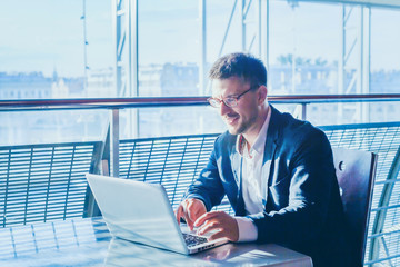 business man entrepreneur working on computer, businessman reading emails and smiling