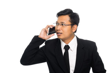 Portrait of a business man with glasses and smart phone. Isolated on white background