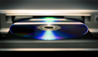 DVD disc inserting to player