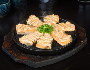japanese cuisine. hot plate fish on the background