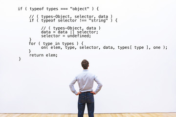 developer looking at the code javascript, abstract coding concept, learning programming
