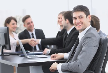 lawyer on the background of business partners handshaking