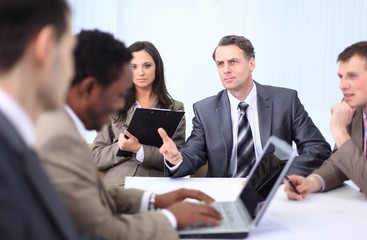 businessman holds working meeting with employees