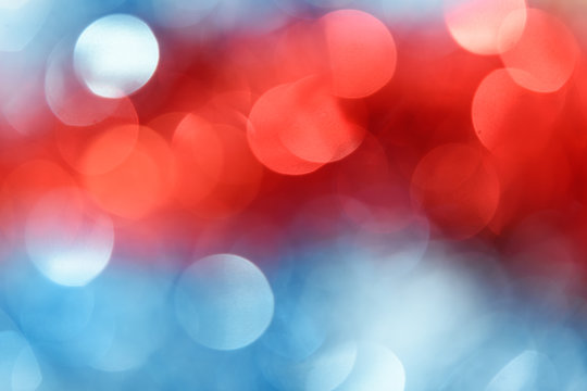 Blue and red colors bokeh background. Christmas background texture