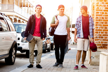 Fototapeta premium Teenage friends walking at the street