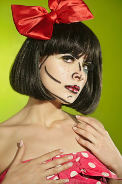 Funny mime girl with a red bow