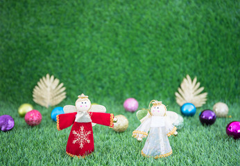 Christmas decoration on grass with copy space