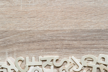 Top view ABC alphabet on wood background