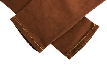 Obraz premium Brown women's casual pants isolated on white background.