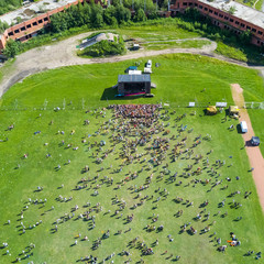 Fototapeta premium View from the drone of the crowd of people in the stadium