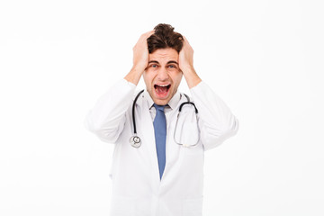 Fototapeta premium Portrait of a furious mad male doctor with stethoscope