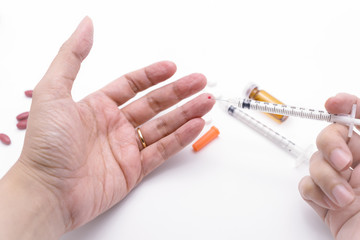 Bleeding medical personnel finger from needle stick injury accident.