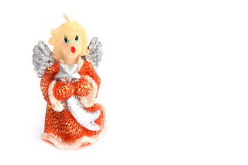 Christmas candle in the form of an angel on the white background. Christmas decorations. Christmas. New Year. New Year card. Card. 2017. Angel