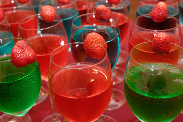 coloured drinks with strawberries