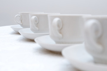 cups on saucers
