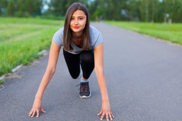 Girl teenager runner at startup