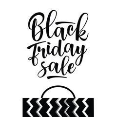 Black Friday sale inscription with  shopping bag.