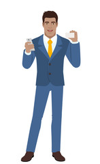 Businessman with mobile phone showing the business card