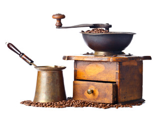  coffee grinder and roasted coffee beans isolated on white background