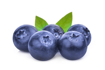 blueberries with green leaves isolated on white background