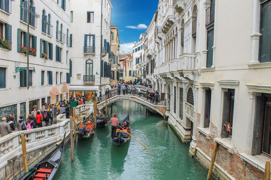 Fototapeta Canal with gondola in Venice
