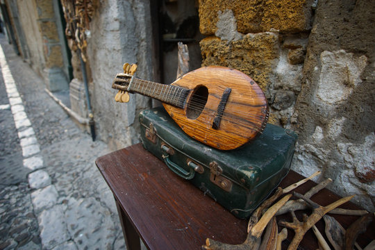 Old worn lute with case