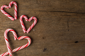 Christmas Candy Cane on wooden board