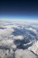 Fototapeta na wymiar aerial view above blue sky and white cloudac
