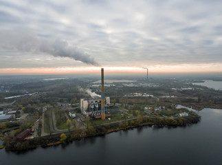 Garbage incineration plant. Waste incinerator plant with smoking smokestack. The problem of environmental pollution by factories.