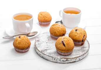 homemade muffins with wild strawberry and green tea
