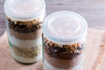 Cover in a jar. Mixing of ingredients for cookies in a jar