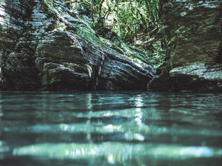 mountain canyon river reflection stream in the jungle