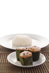 steamed fish with curry paste on white dish isolated on white background, Free from copy space. Thai food style..